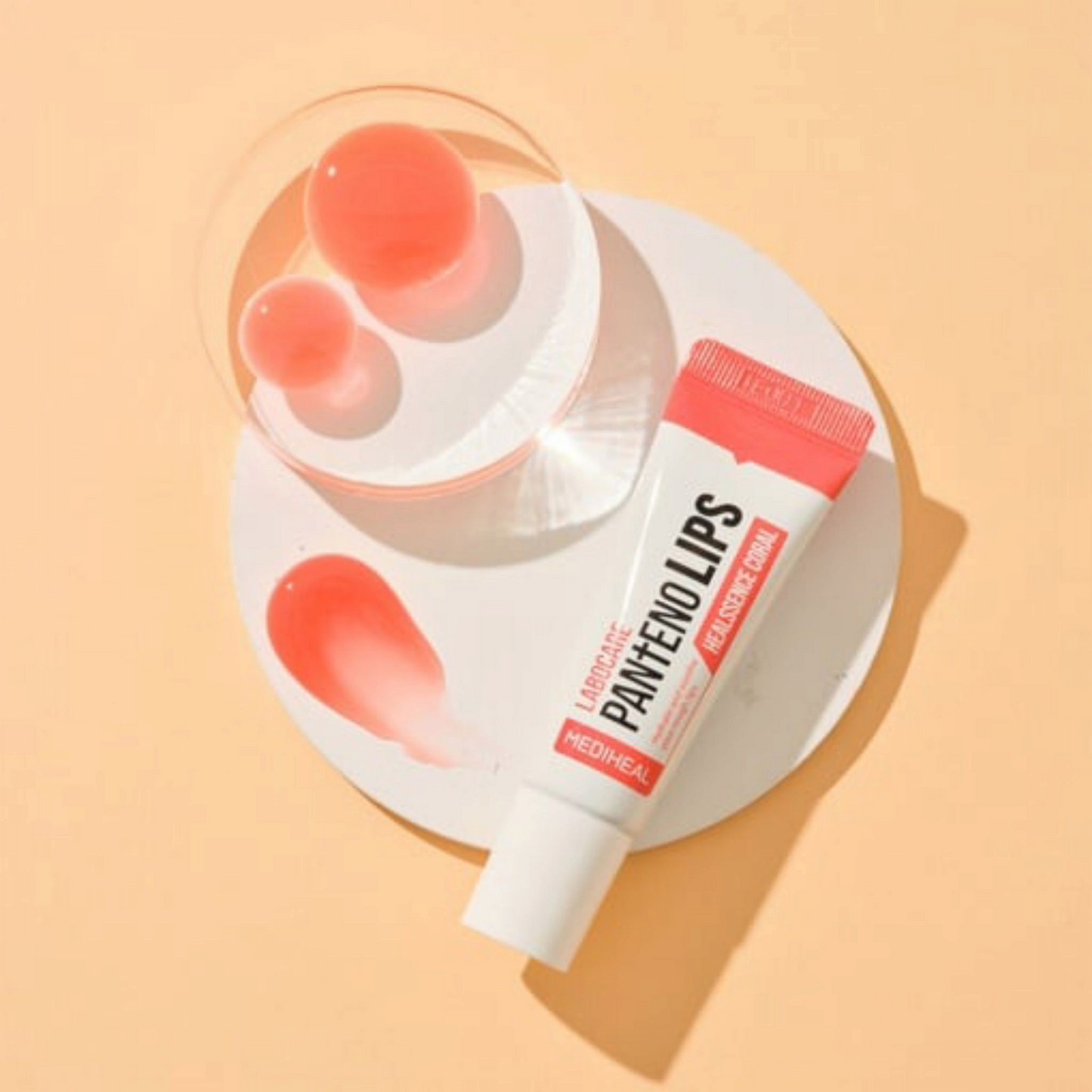 MEDIHEAL Labocare Pantenolips Healssence Coral Lip Balm, balsam de buze hidratant cu panthenol care repară și catifelează buzele