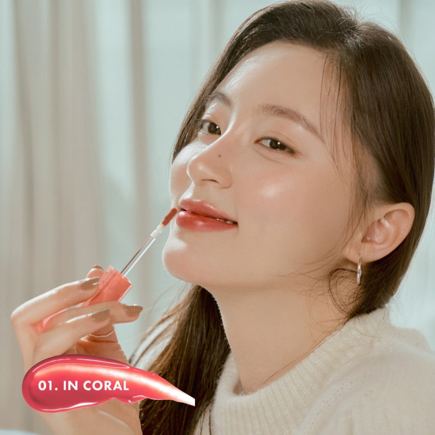 ROM&ND Dewyful Water Tint 01 In Coral, ruj lichid corai care oferă buzelor o culoare fresh și un finish strălucitor